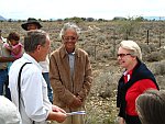 Federal Minister Schavan talking with Norbert Jrgens and Gerhard Olivier, owner of the farm Duruchaus.